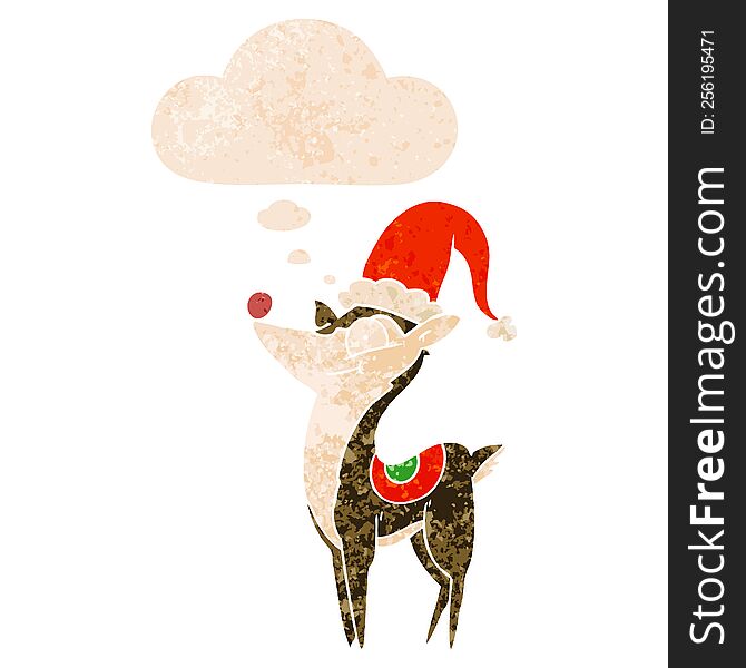 cartoon christmas reindeer and thought bubble in retro textured style