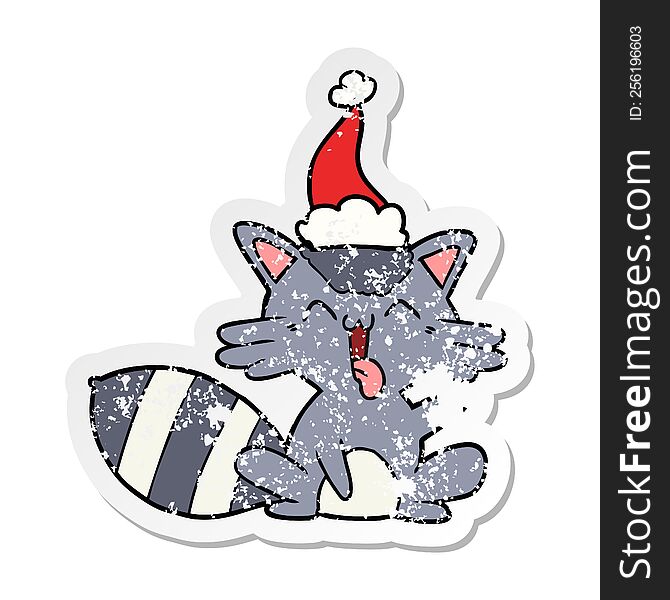 Cute Distressed Sticker Cartoon Of A Raccoon Wearing Santa Hat