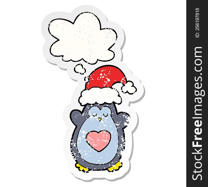 Cute Christmas Penguin And Thought Bubble As A Distressed Worn Sticker