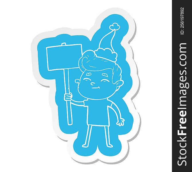happy quirky cartoon  sticker of a man with sign wearing santa hat