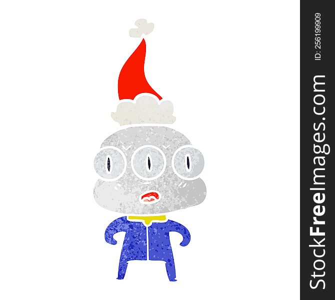 Retro Cartoon Of A Three Eyed Alien Wearing Santa Hat