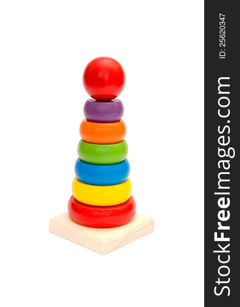 Child toy wooden colorful tower on white background