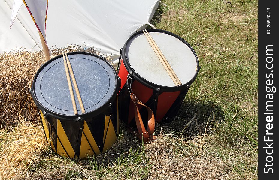 Warlike drums in front of the tent