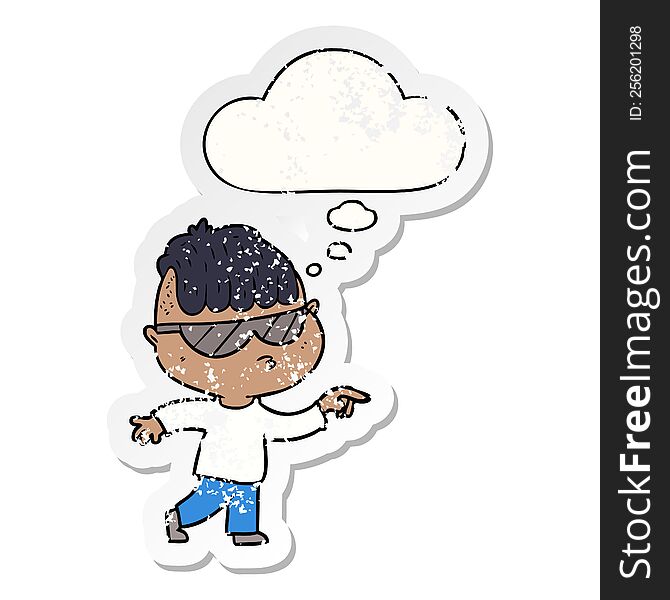 cartoon boy wearing sunglasses pointing with thought bubble as a distressed worn sticker