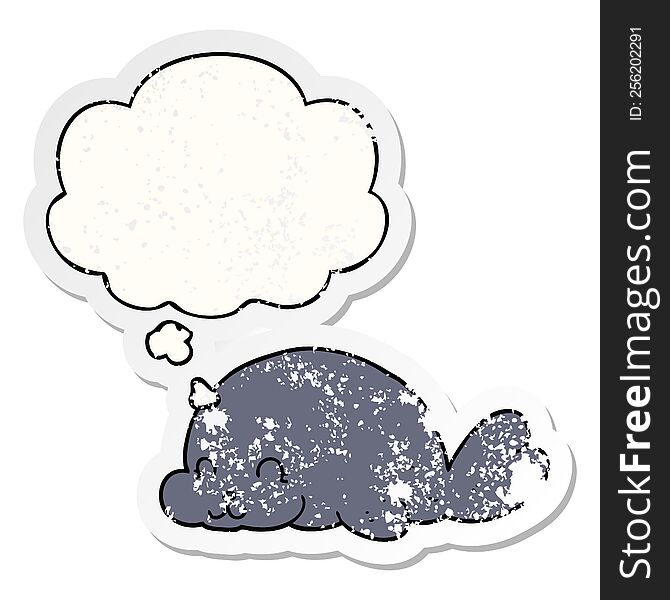 cute cartoon seal with thought bubble as a distressed worn sticker