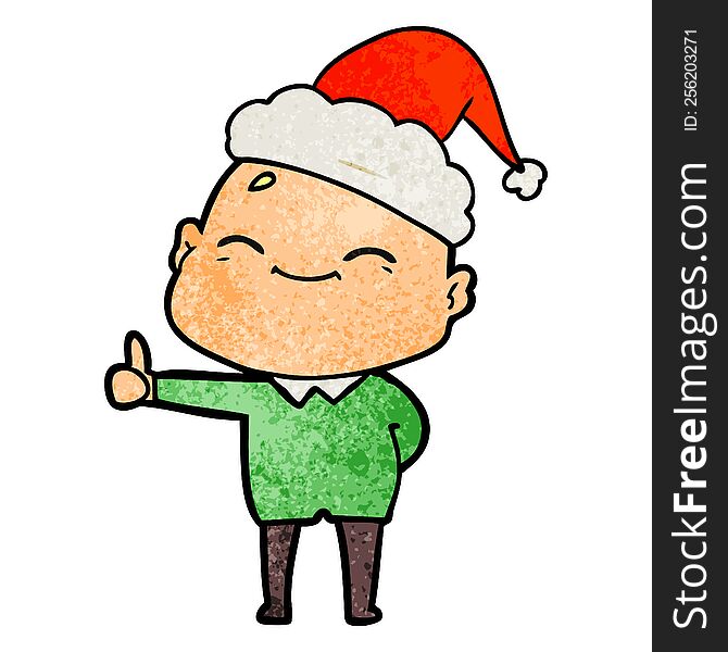 Happy Textured Cartoon Of A Bald Man Wearing Santa Hat