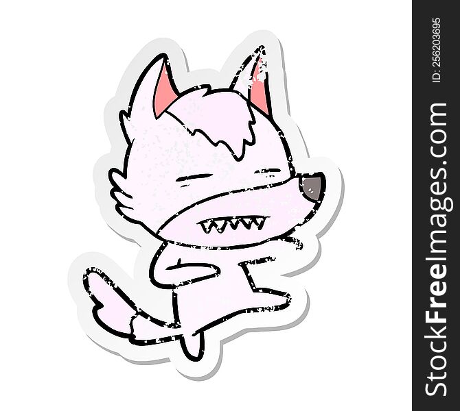 distressed sticker of a cartoon wolf kicking