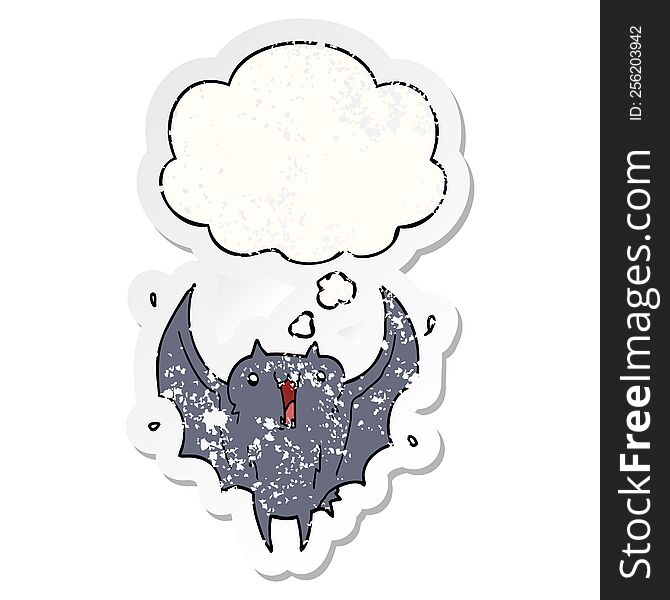 cartoon happy vampire bat and thought bubble as a distressed worn sticker