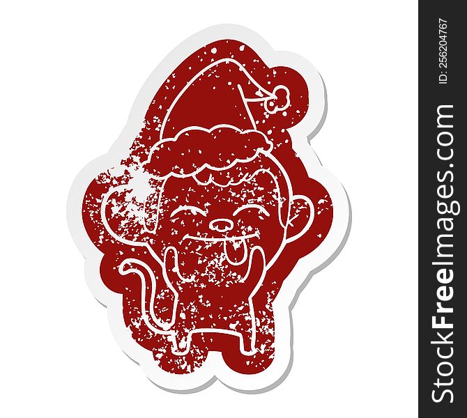 Funny Cartoon Distressed Sticker Of A Monkey Wearing Santa Hat