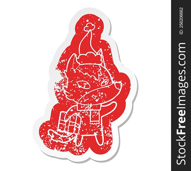 Friendly Cartoon Distressed Sticker Of A Christmas Wolf Wearing Santa Hat