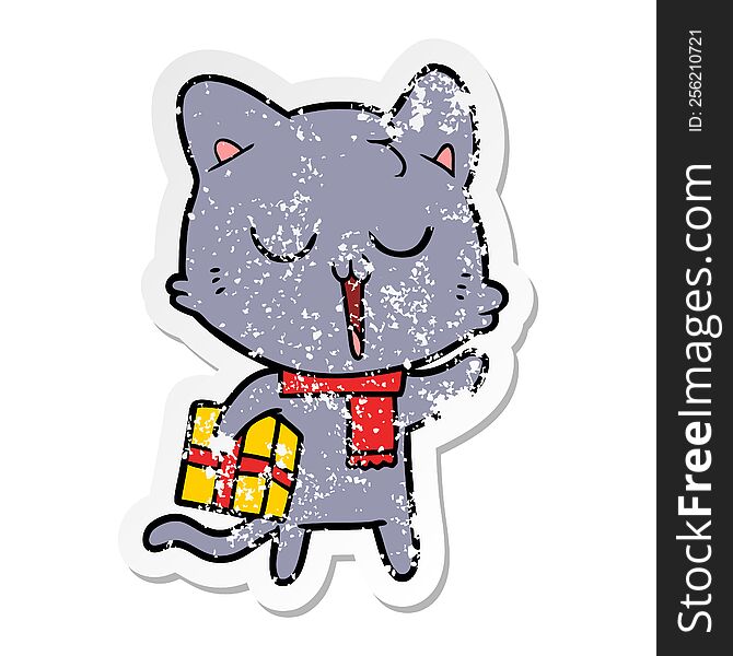 Distressed Sticker Of A Cartoon Cat With Gift