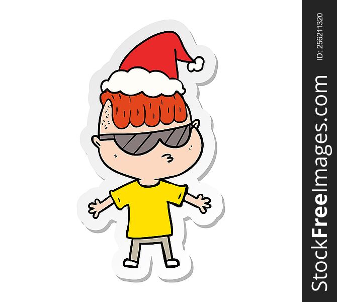 hand drawn sticker cartoon of a boy wearing sunglasses wearing santa hat