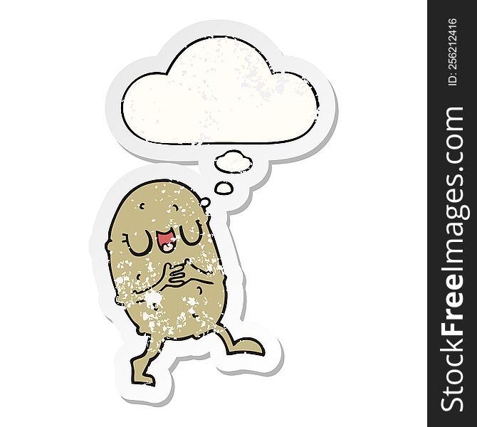 cartoon happy potato with thought bubble as a distressed worn sticker