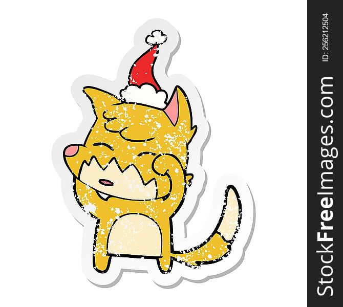 Distressed Sticker Cartoon Of A Fox Wearing Santa Hat