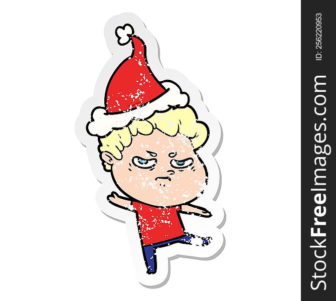 Distressed Sticker Cartoon Of A Angry Man Wearing Santa Hat