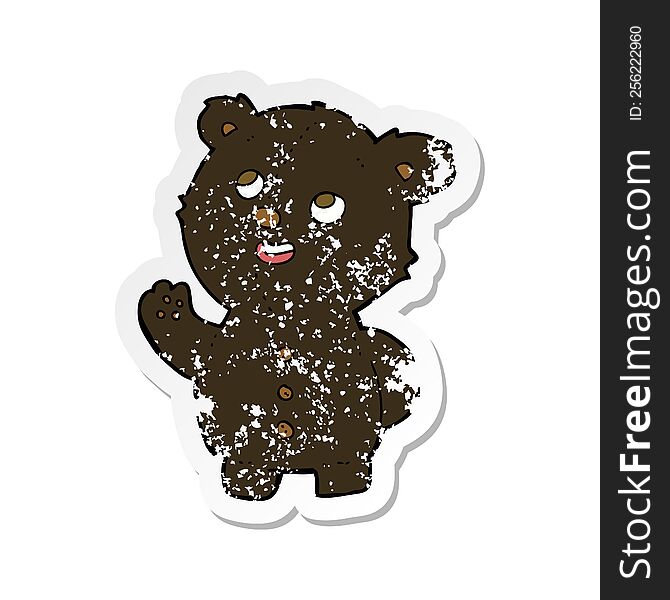 retro distressed sticker of a cartoon cute black bear cub