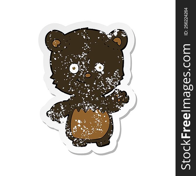 Retro Distressed Sticker Of A Cartoon Black Bearcub Waving