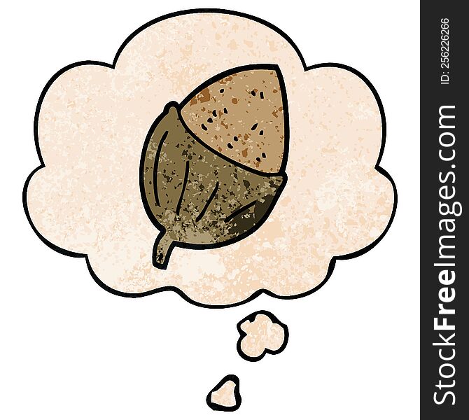 cartoon acorn with thought bubble in grunge texture style. cartoon acorn with thought bubble in grunge texture style