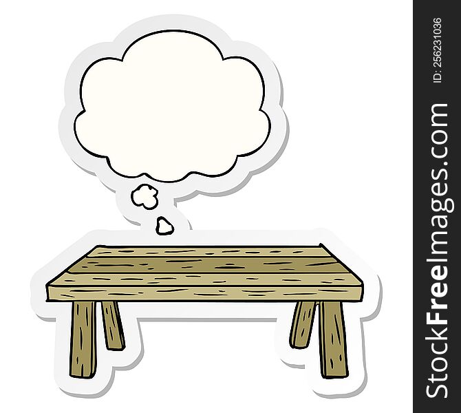 cartoon table with thought bubble as a printed sticker