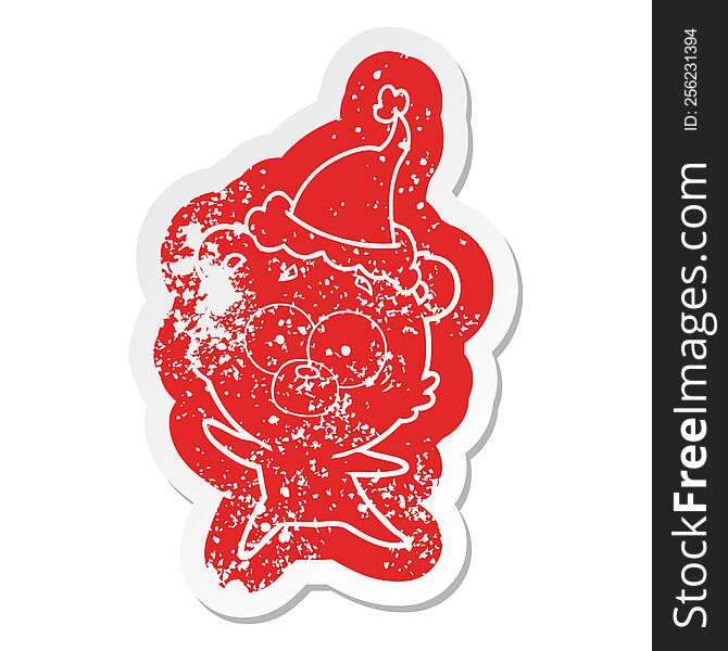 Anxious Bear Cartoon Distressed Sticker Of A Wearing Santa Hat