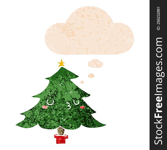 cute cartoon christmas tree and thought bubble in retro textured style