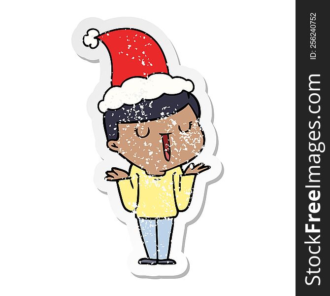 hand drawn distressed sticker cartoon of a happy boy with no worries wearing santa hat