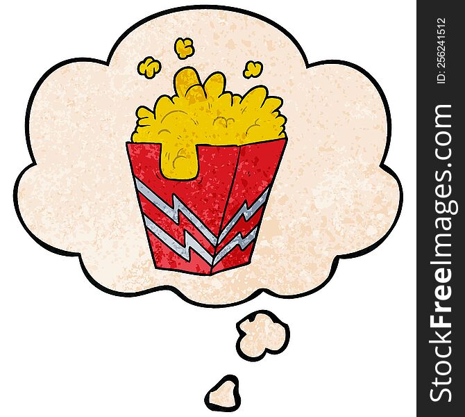 cartoon box of popcorn with thought bubble in grunge texture style. cartoon box of popcorn with thought bubble in grunge texture style