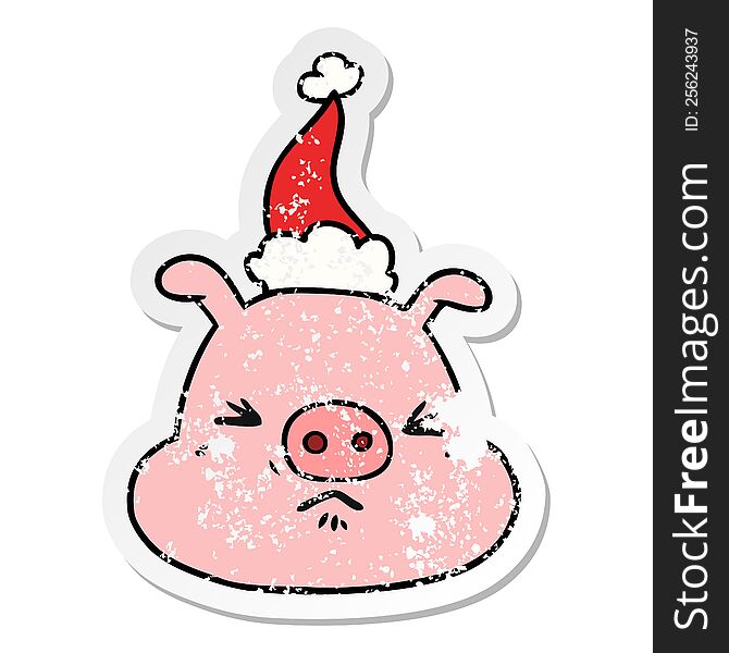 Distressed Sticker Cartoon Of A Angry Pig Face Wearing Santa Hat