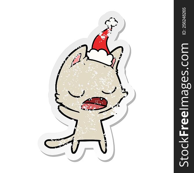 Talking Cat Distressed Sticker Cartoon Of A Wearing Santa Hat