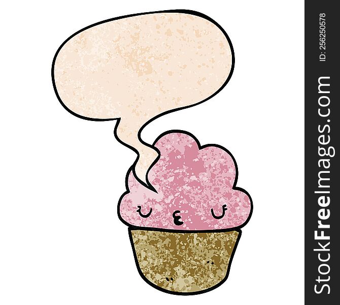 cartoon cupcake with face with speech bubble in retro texture style. cartoon cupcake with face with speech bubble in retro texture style