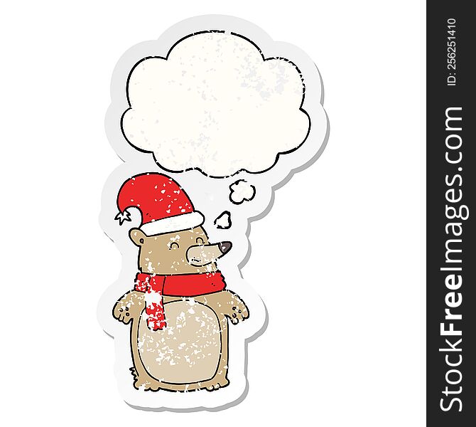 cartoon christmas bear with thought bubble as a distressed worn sticker
