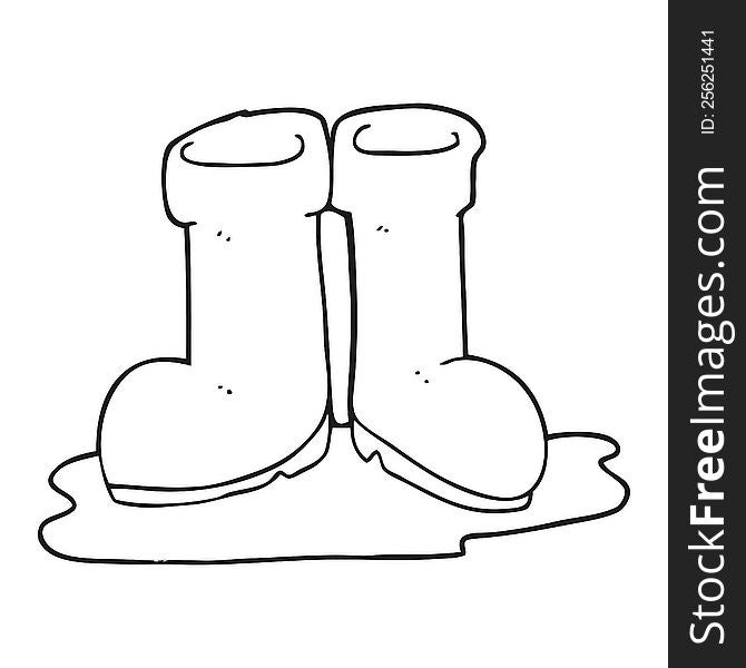 freehand drawn black and white cartoon wellington boots in puddle