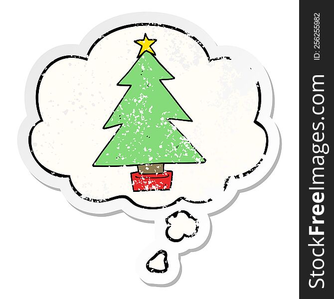 cartoon christmas tree with thought bubble as a distressed worn sticker