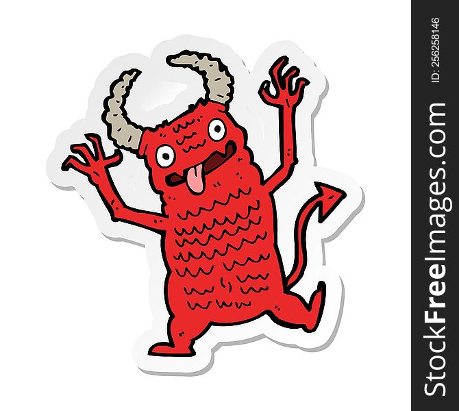 sticker of a cartoon demon
