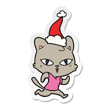 Sticker Cartoon Of A Cat Out For A Run Wearing Santa Hat Stock Photo