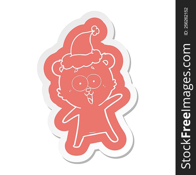 laughing teddy  bear cartoon  sticker of a wearing santa hat