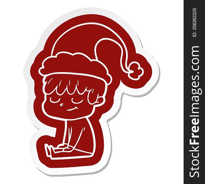 quirky cartoon  sticker of a happy boy wearing santa hat