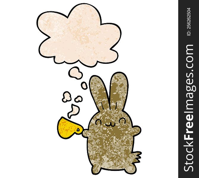cute cartoon rabbit drinking coffee with thought bubble in grunge texture style. cute cartoon rabbit drinking coffee with thought bubble in grunge texture style