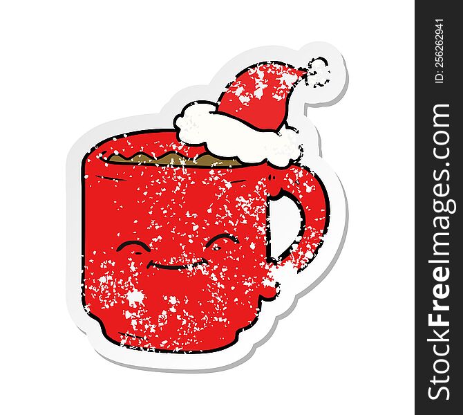 hand drawn distressed sticker cartoon of a coffee mug wearing santa hat