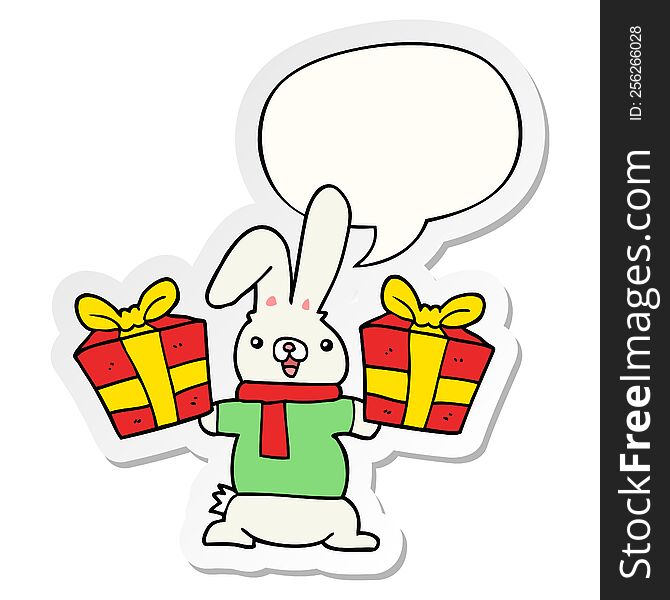 cartoon rabbit with christmas presents with speech bubble sticker. cartoon rabbit with christmas presents with speech bubble sticker
