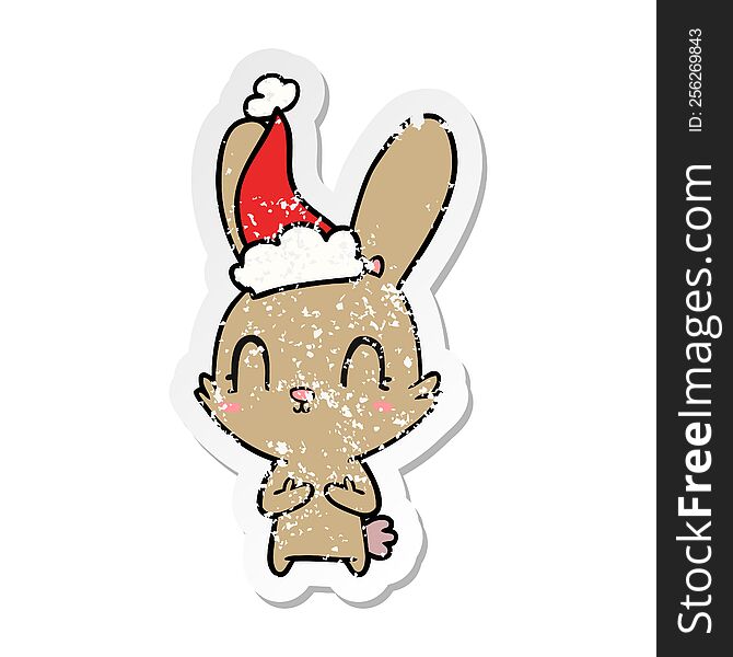 Cute Distressed Sticker Cartoon Of A Rabbit Wearing Santa Hat