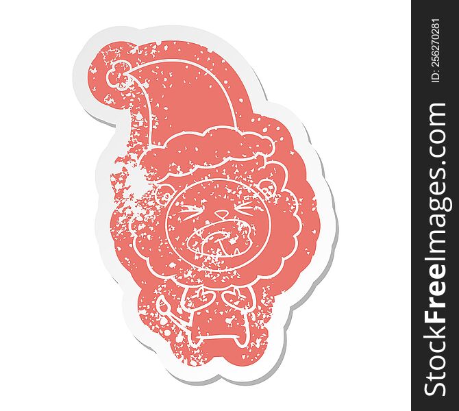 Cartoon Distressed Sticker Of A Lion Wearing Santa Hat