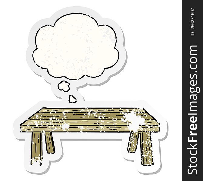 Cartoon Table And Thought Bubble As A Distressed Worn Sticker