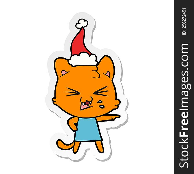 Sticker Cartoon Of A Hissing Cat Wearing Santa Hat