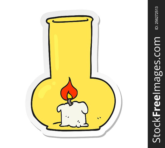 sticker of a cartoon old glass lamp and candle