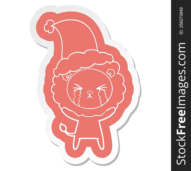 Cartoon  Sticker Of A Crying Lion Wearing Santa Hat
