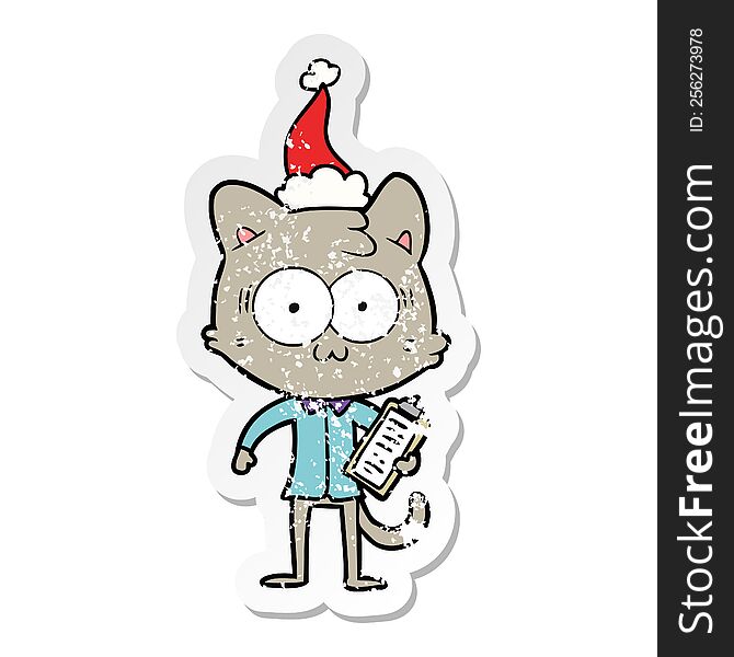 hand drawn distressed sticker cartoon of a surprised office worker cat wearing santa hat