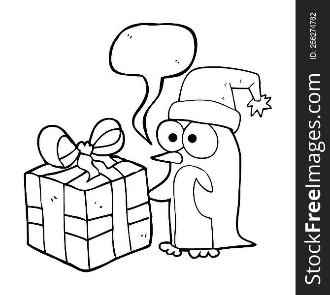 freehand drawn speech bubble cartoon christmas penguin with present