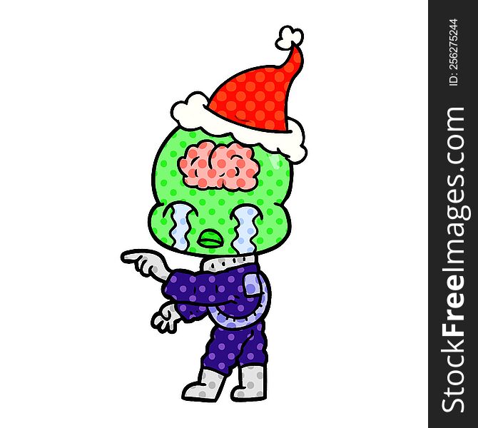 hand drawn comic book style illustration of a big brain alien crying and pointing wearing santa hat