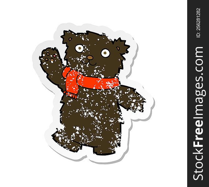 retro distressed sticker of a cartoon teddy bear wearing scarf
